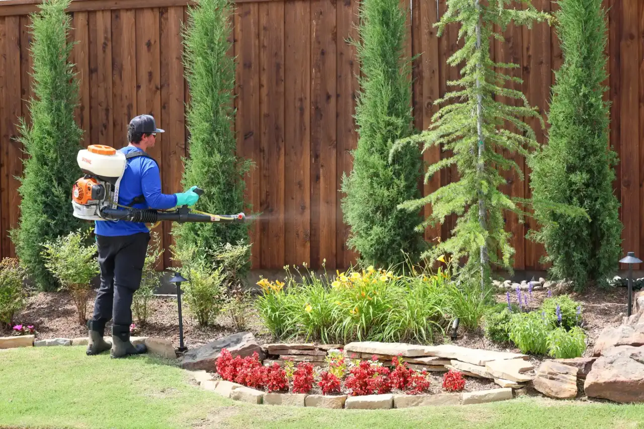 Professional mosquito fogging treatment applied to residential yard